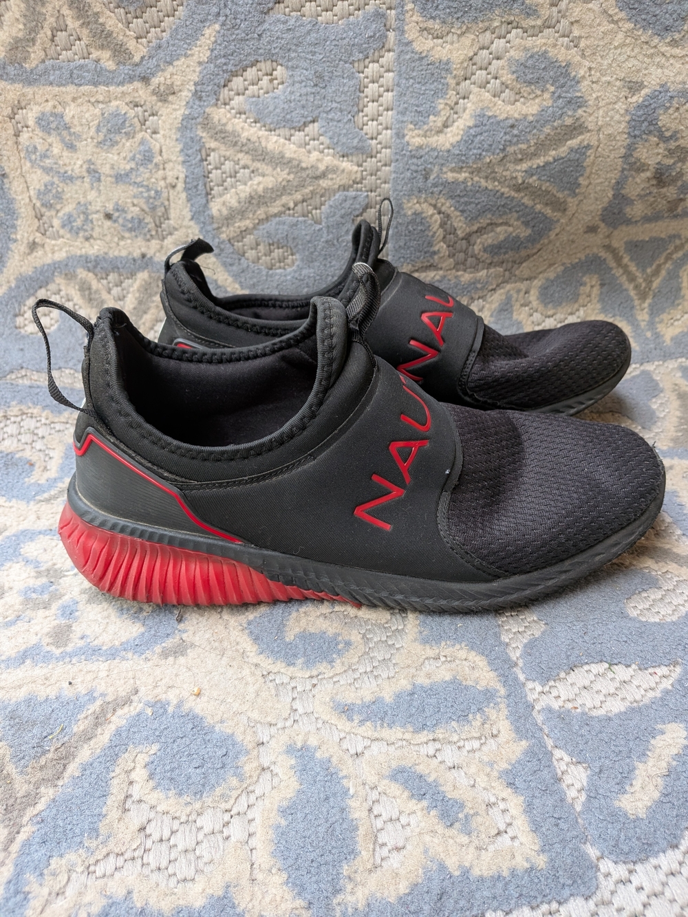 Nautica  Black Slip-On Sneakers with Red Accents